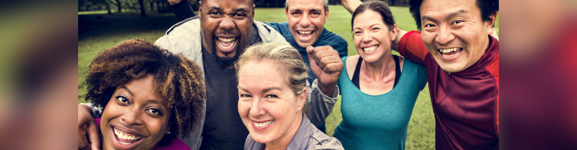 Group of cheerful diverse friends in the park
